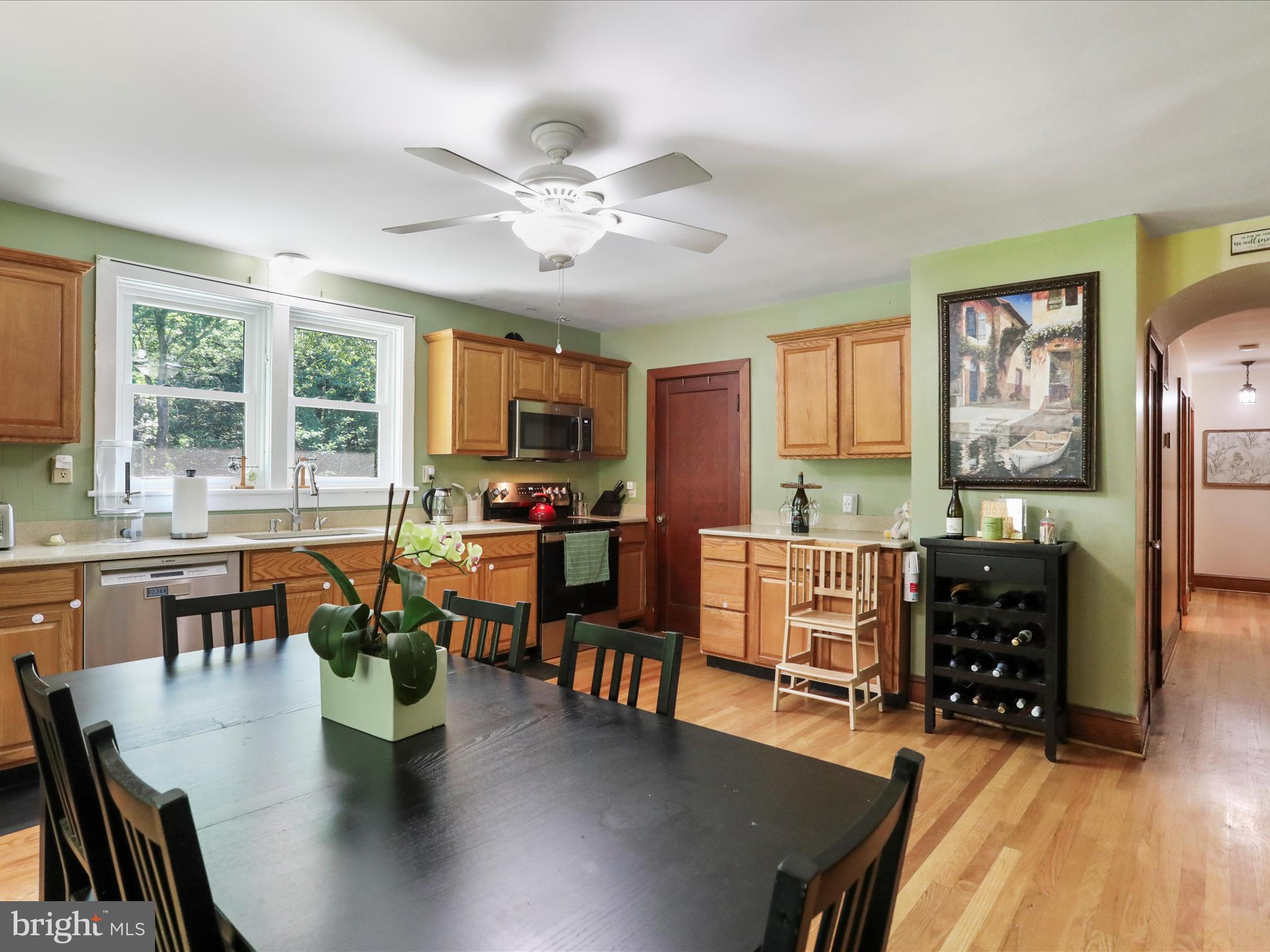 6927 Kellys Store Road Thurmont, MD 21788 - Photo 5 of 42 a view of a dining room with furniture window and wooden floor