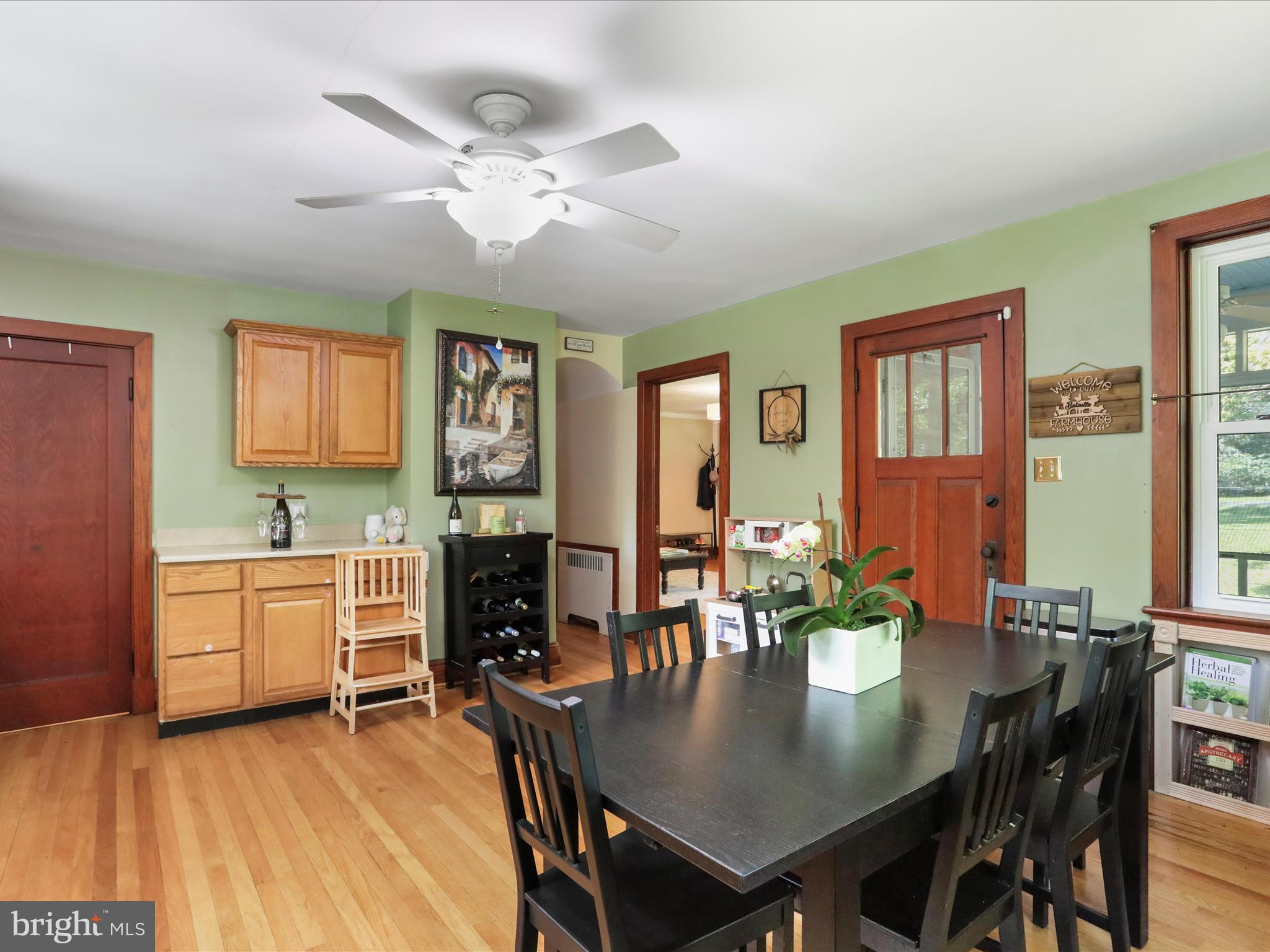 6927 Kellys Store Road Thurmont, MD 21788 - Photo 8 of 42 a view of a dining room with furniture and chandelier