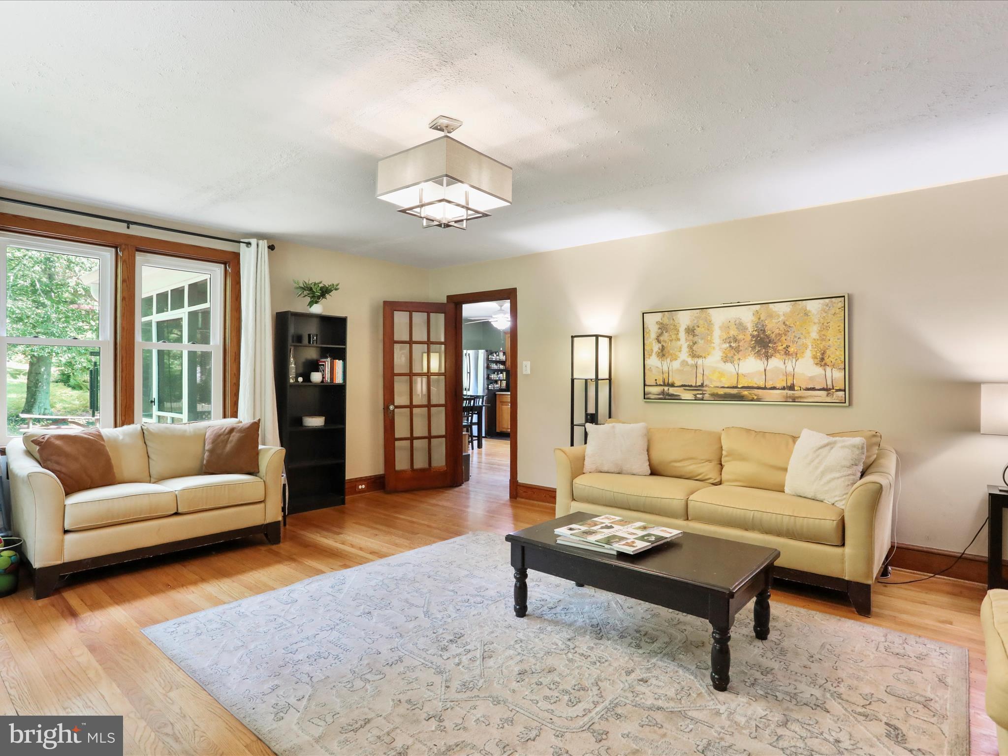 6927 Kellys Store Road Thurmont, MD 21788 - Photo 9 of 42 a living room with furniture and a large window