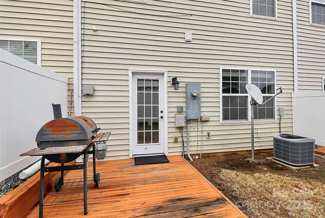 a bench sitting in front of a house
