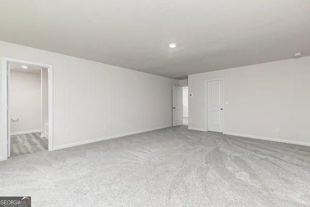 an empty room with an entryway