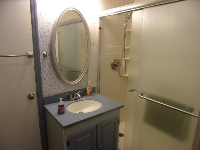 28 Graff Road Knox, PA 16232 - Photo 9 of 17 a bathroom with a sink vanity granite and a mirror