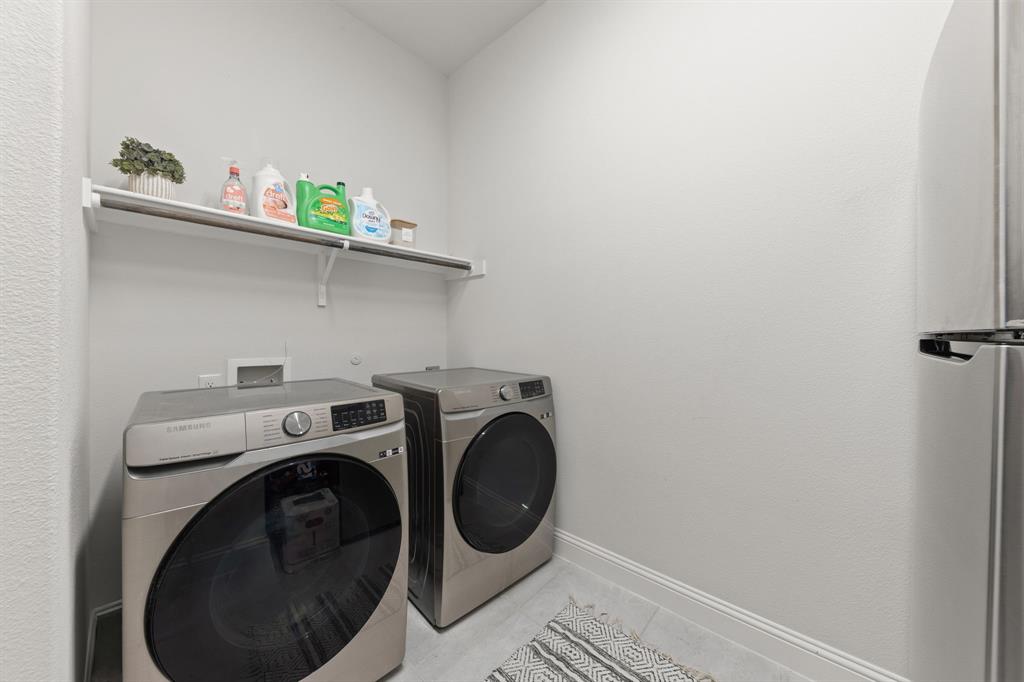 8808 Royal Star Road Rowlett, TX 75089 - Photo 34 of 40 a utility room with dryer and washer