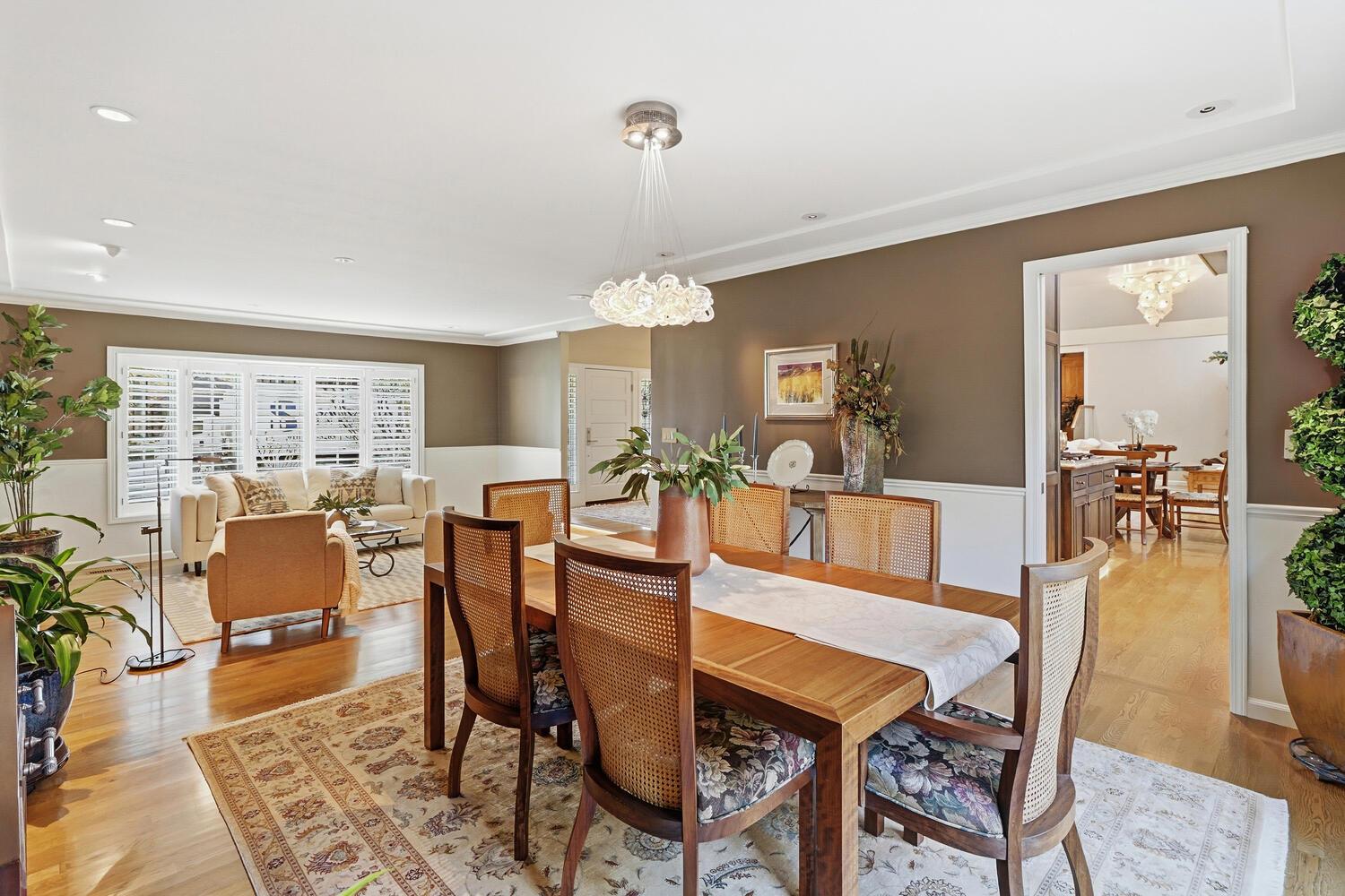 1749 Haggin Grove Way Carmichael, CA 95608 - Photo 15 of 99 a view of a dining room with furniture and wooden floor