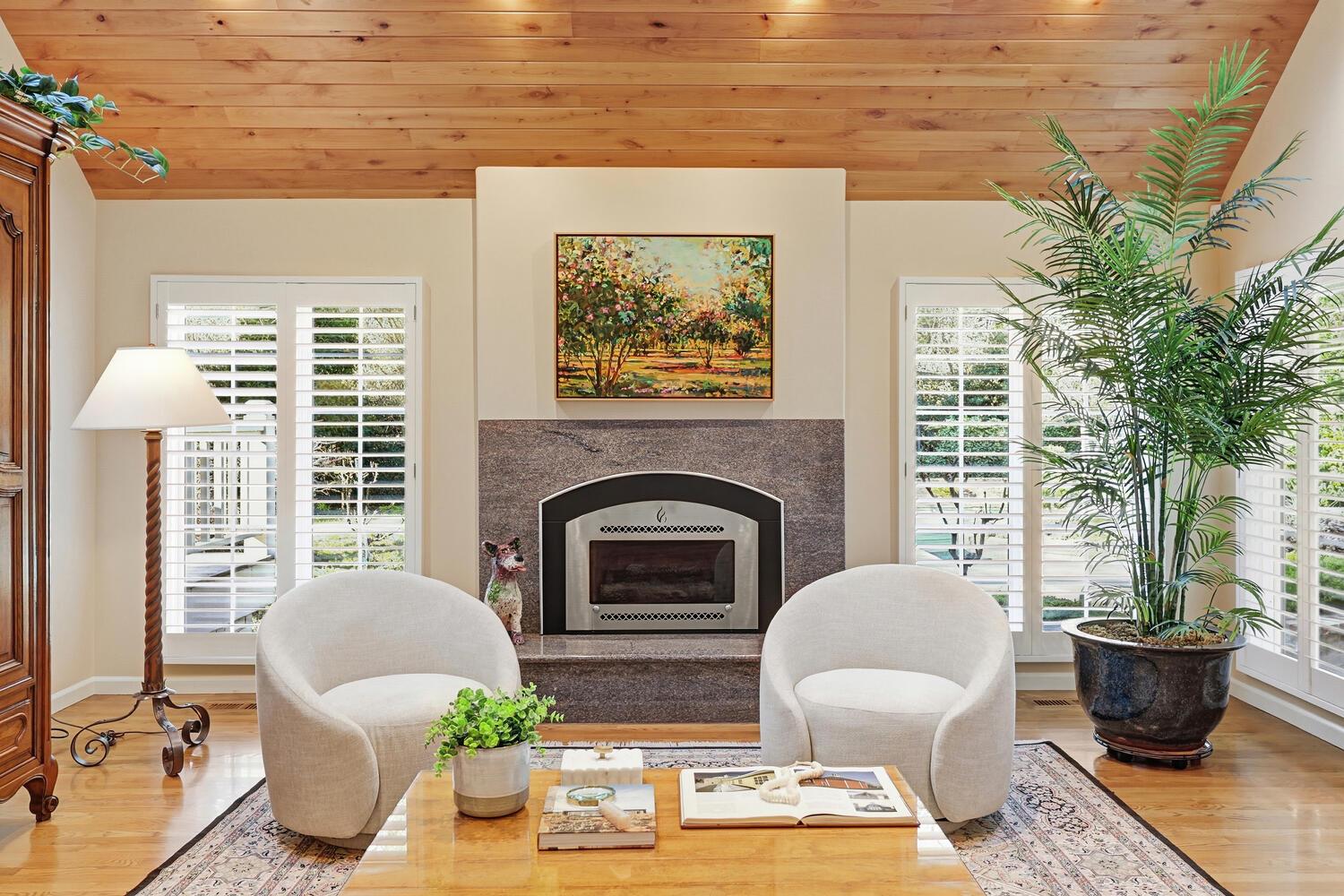 1749 Haggin Grove Way Carmichael, CA 95608 - Photo 18 of 99 a living room with furniture and a fireplace