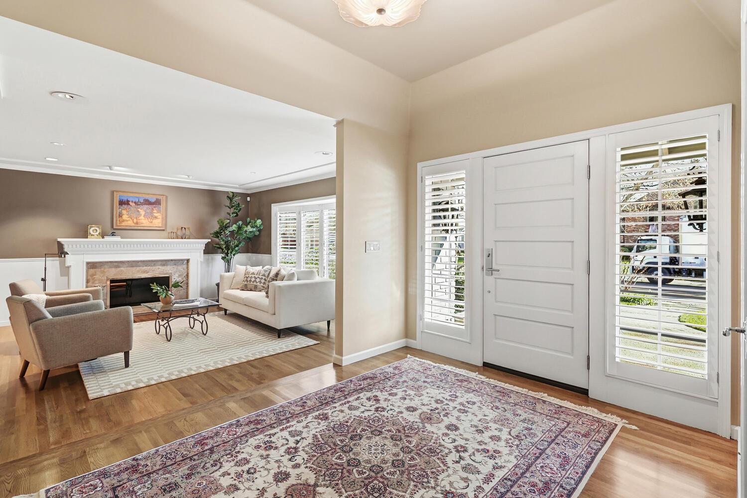1749 Haggin Grove Way Carmichael, CA 95608 - Photo 6 of 99 a living room with furniture and a fireplace