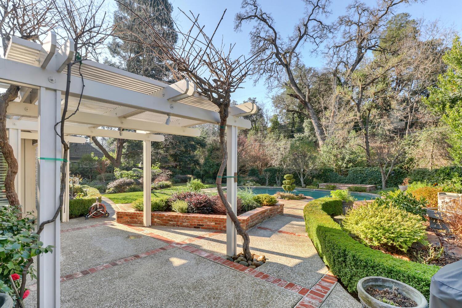1749 Haggin Grove Way Carmichael, CA 95608 - Photo 67 of 99 a view of a patio with chairs and a table