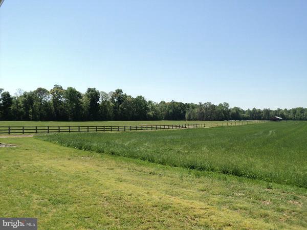 0 Dion Road Federalsburg, MD 21632 - Photo 4 of 6 a view of a golf course with a lake