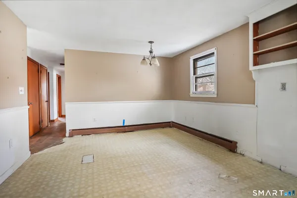 an empty room with windows