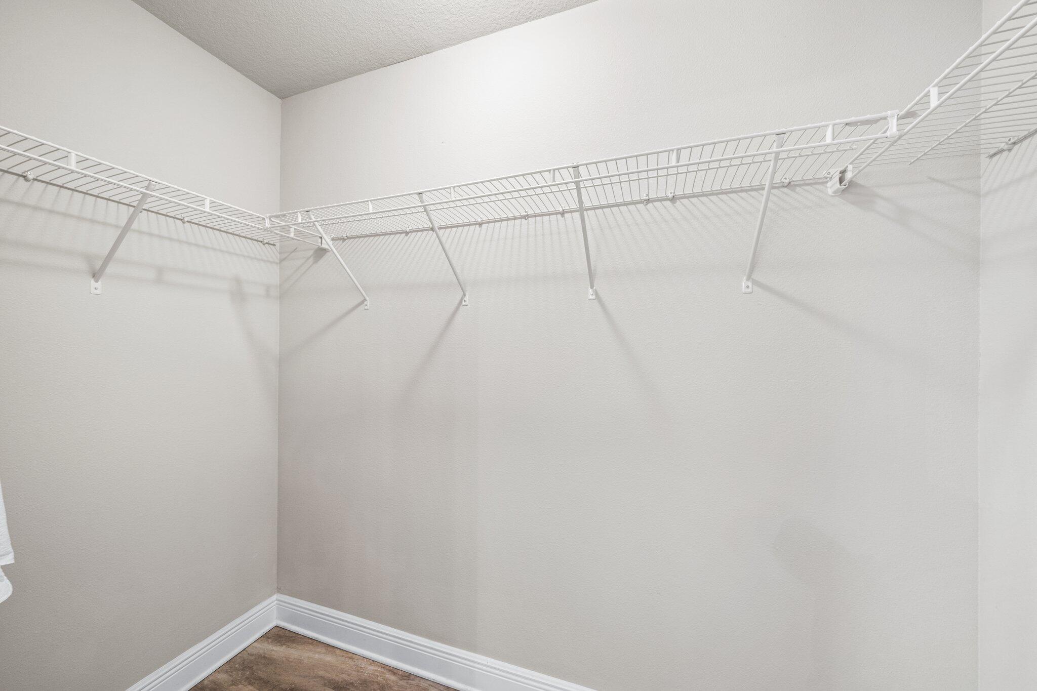 64 Crossing Lane, Unit E Santa Rosa Beach, FL 32459 - Photo 13 of 22 a view of a room with racks on the wall