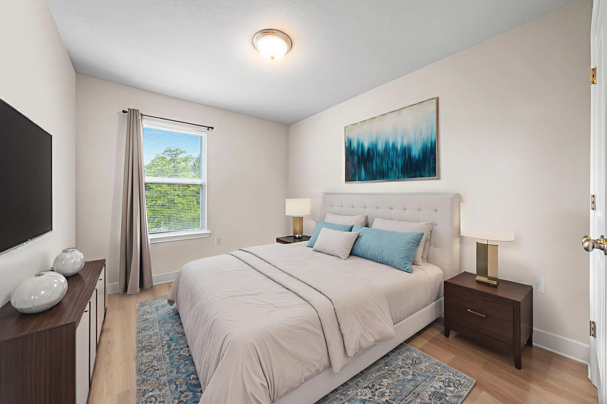 64 Crossing Lane, Unit E Santa Rosa Beach, FL 32459 - Photo 16 of 22 a bedroom with a bed and flat screen tv