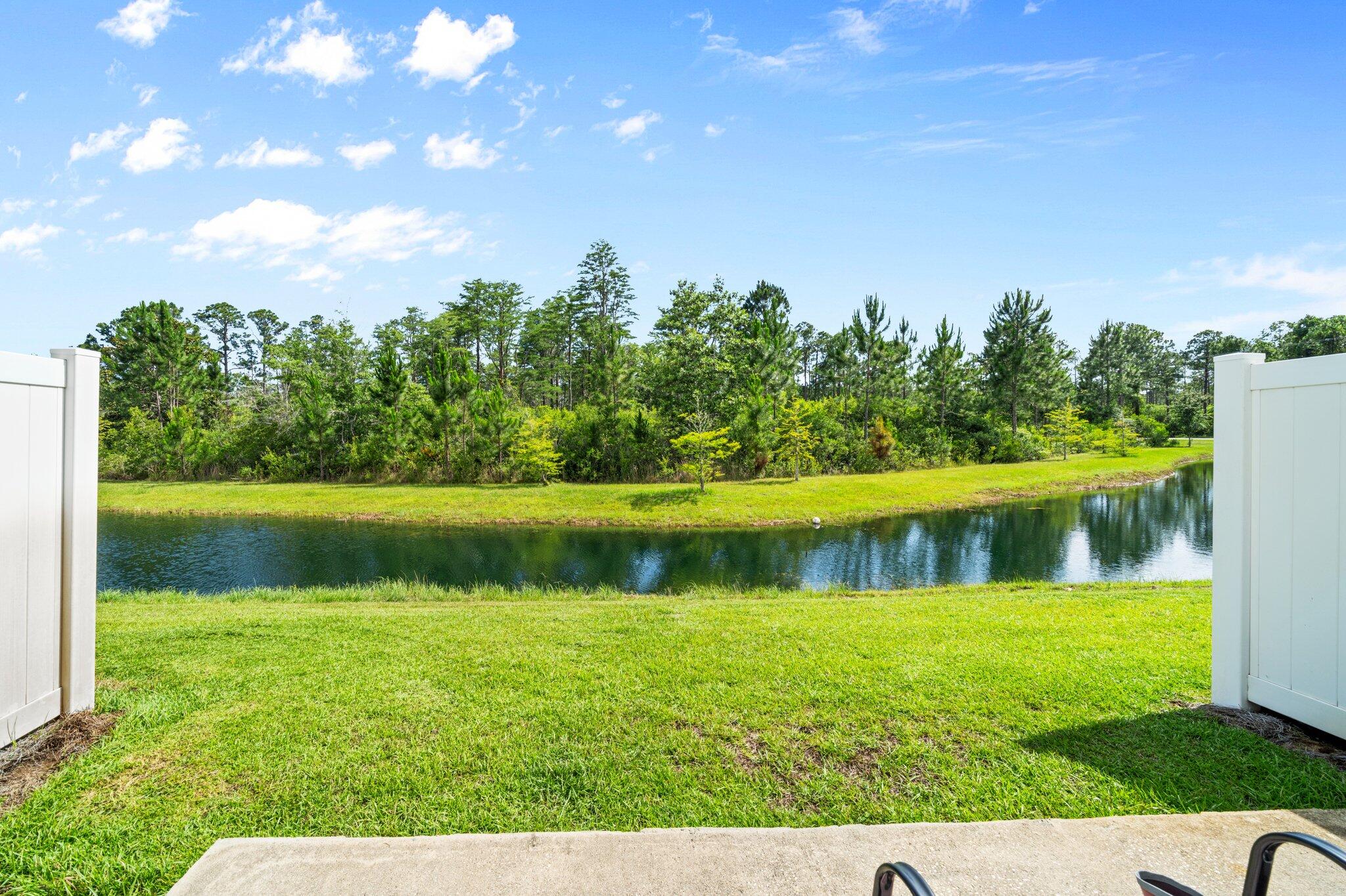 64 Crossing Lane, Unit E Santa Rosa Beach, FL 32459 - Photo 19 of 22 a view of lake with green space