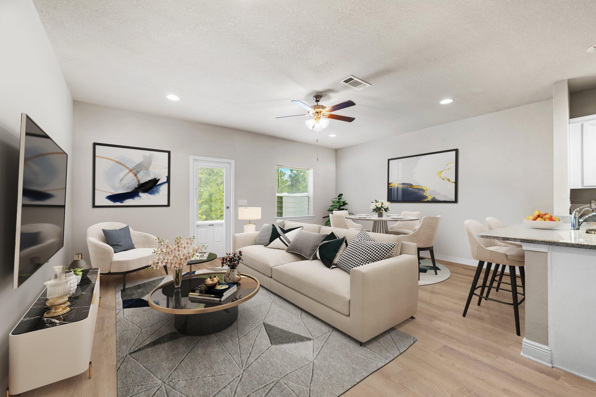 64 Crossing Lane, Unit E Santa Rosa Beach, FL 32459 - Photo 2 of 22 a living room with furniture and a flat screen tv