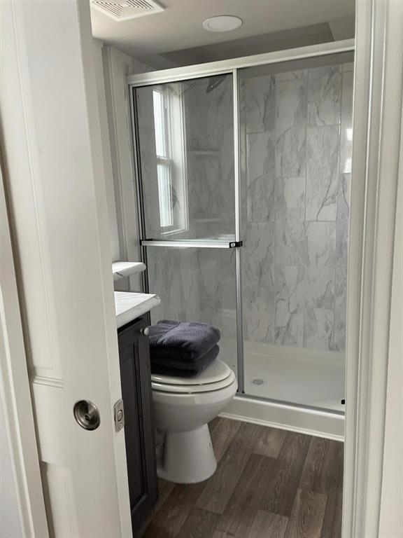 5226 Waterfront Road Kerens, TX 75144 - Photo 5 of 7 a bathroom with a shower and a toilet