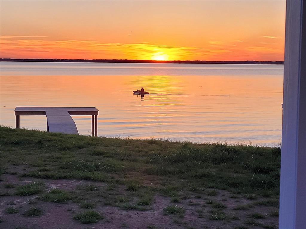 5226 Waterfront Road Kerens, TX 75144 - Photo 7 of 7 a view of a lake from a yard