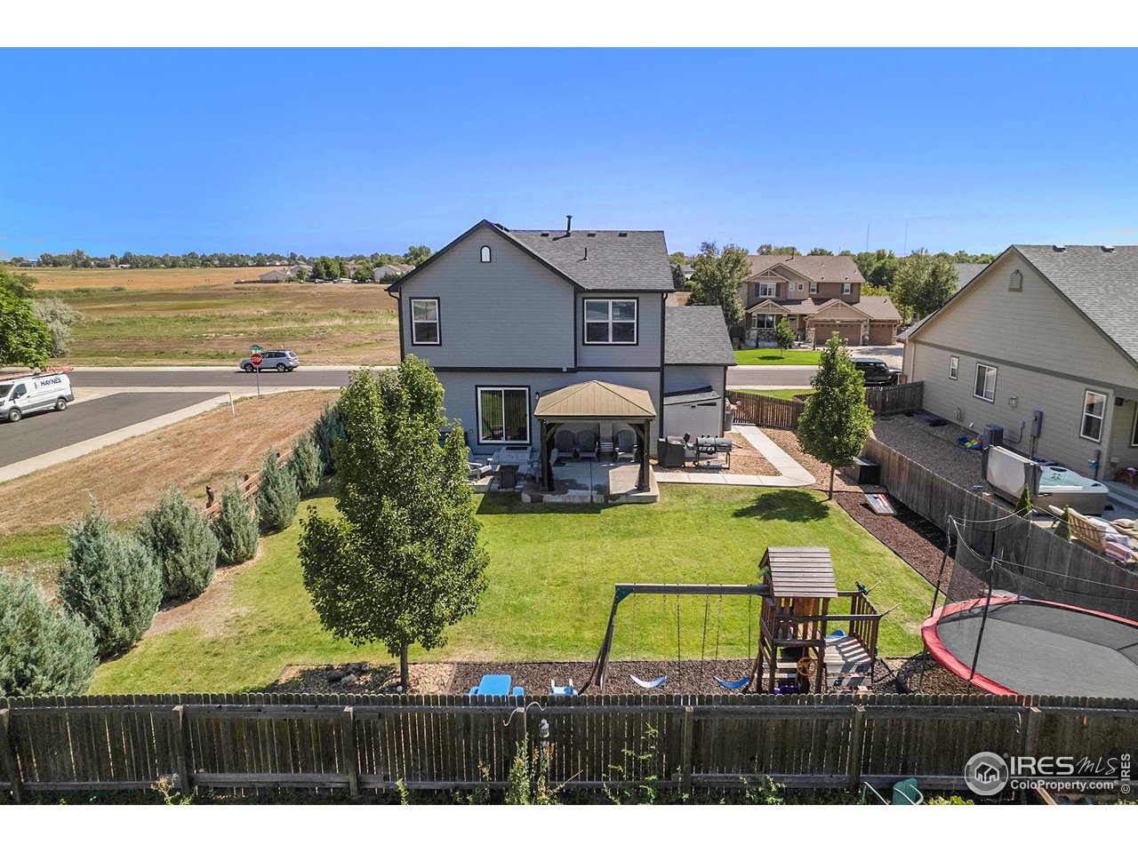 8421 Raspberry Drive Frederick, CO 80504 - Photo 3 of 24 a view of a house with outdoor space
