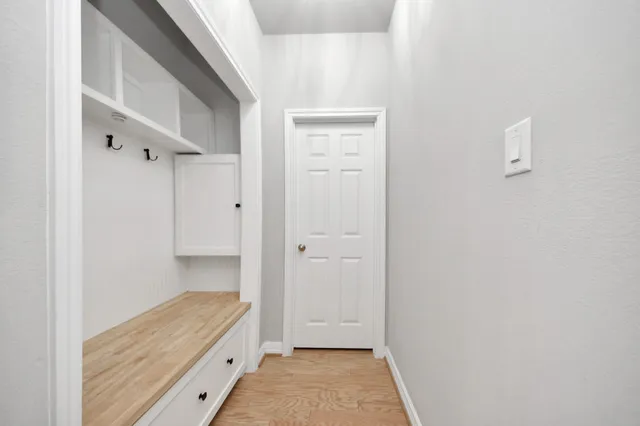 a view of kitchen with sink microwave and stove