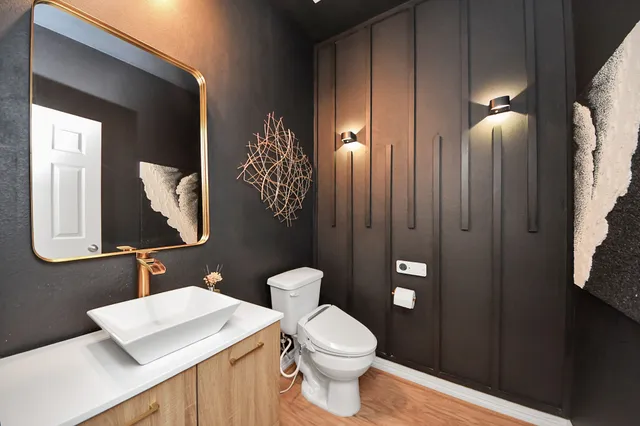 a view of kitchen with sink and microwave