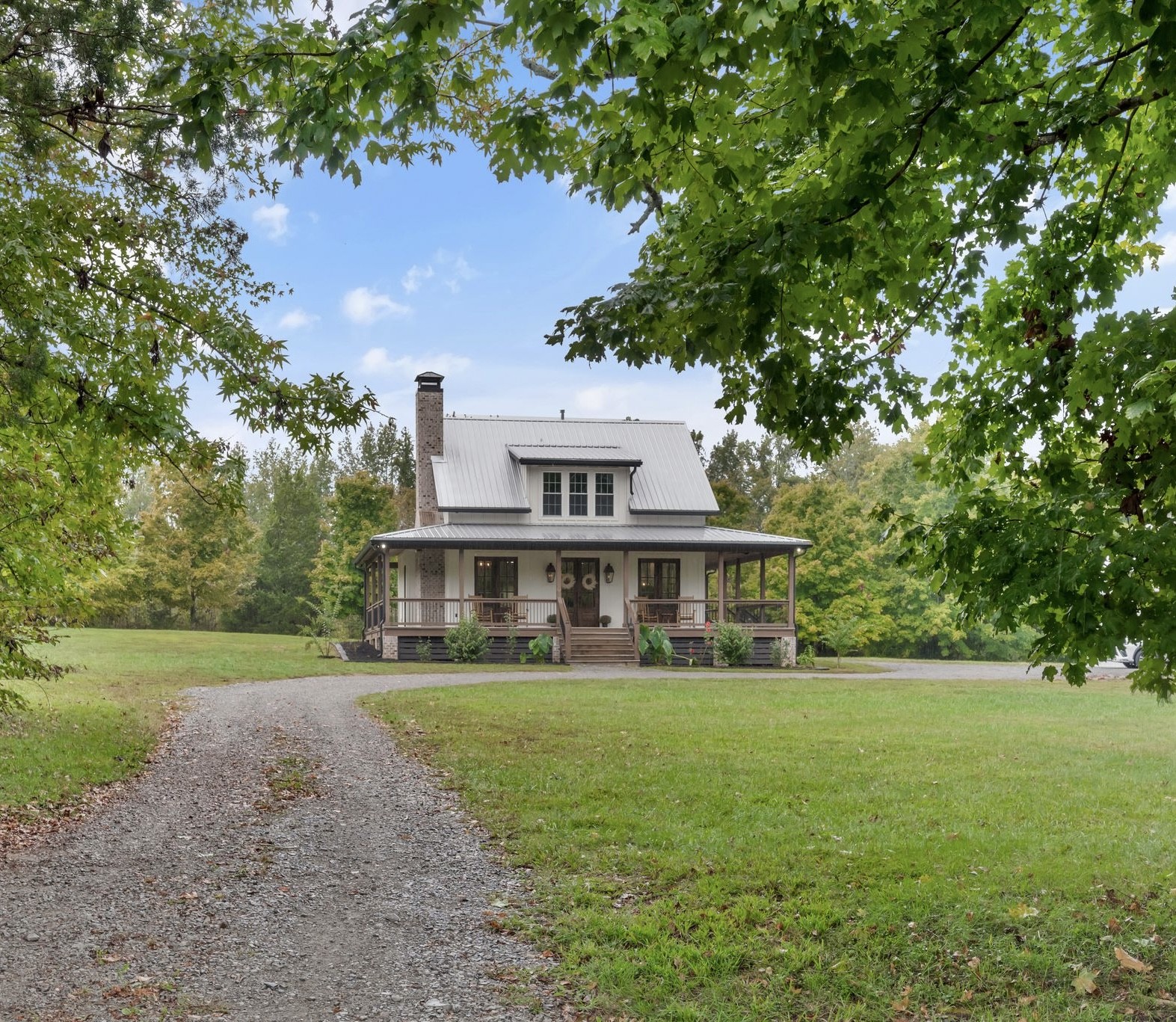 1006 Cherokee Trail Springfield, TN 37172 - Photo 1 of 49 a front view of a house with a garden