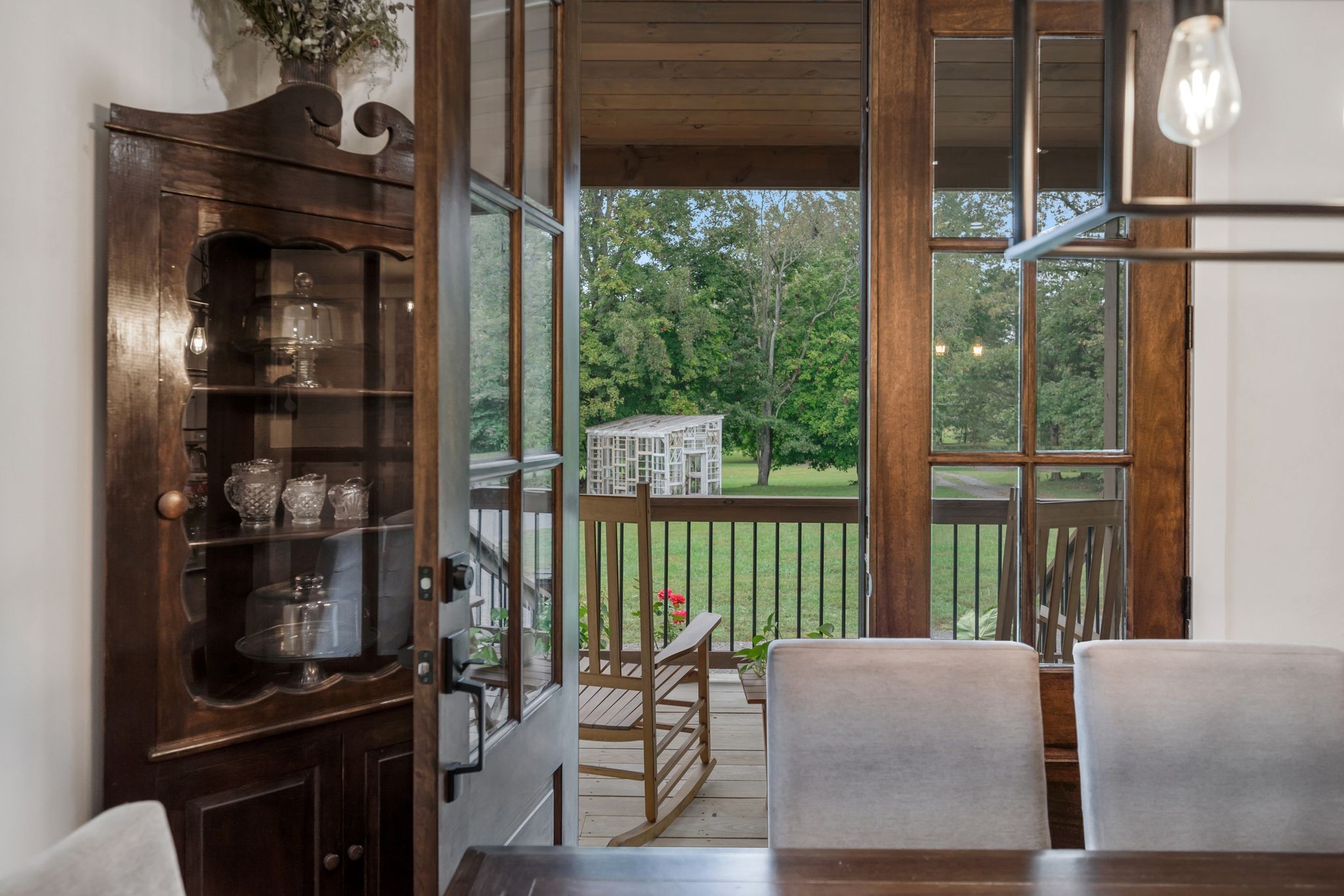 1006 Cherokee Trail Springfield, TN 37172 - Photo 16 of 49 a living room with a fireplace furniture and a floor to ceiling window