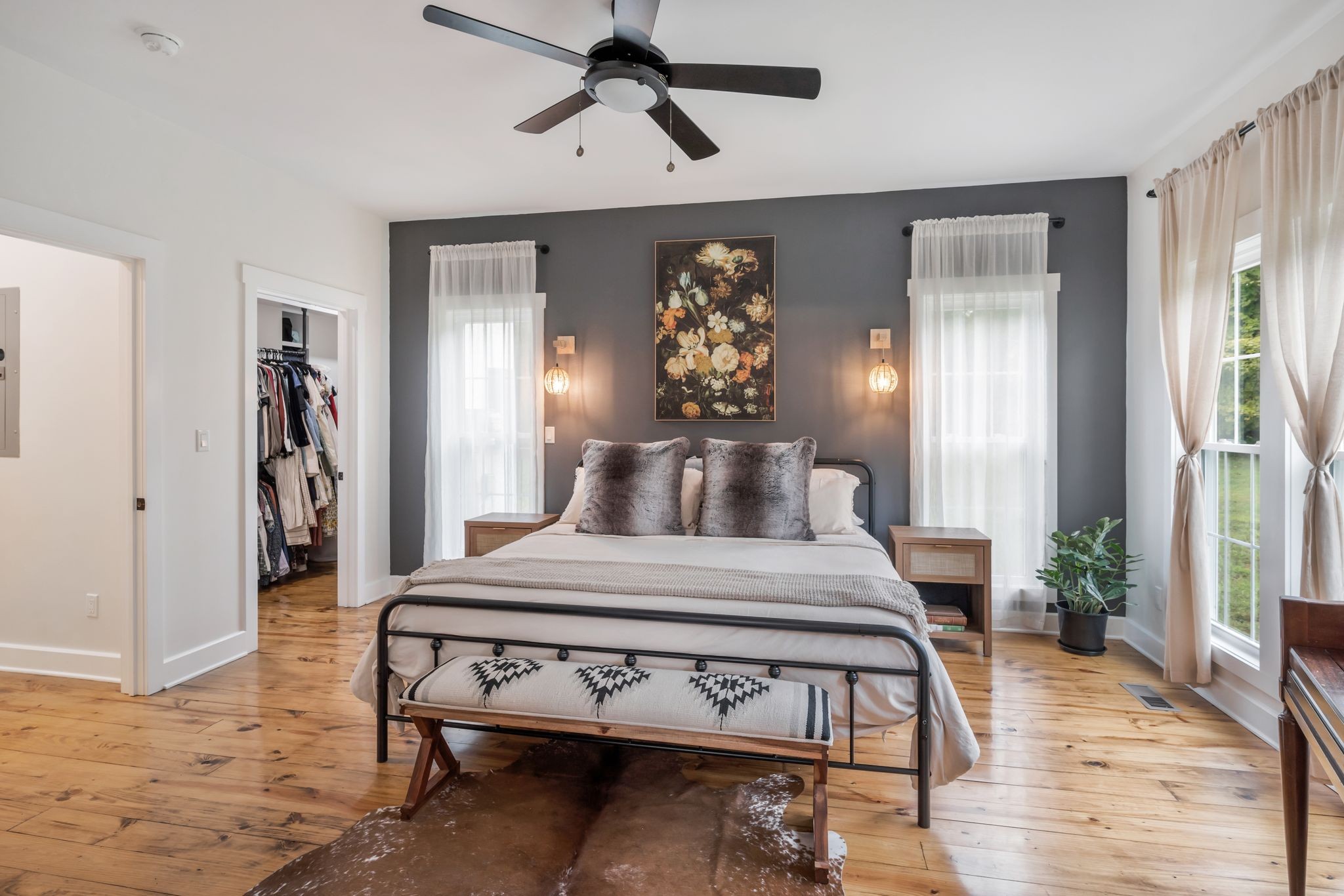 1006 Cherokee Trail Springfield, TN 37172 - Photo 24 of 49 a bedroom with a bed and wooden floor