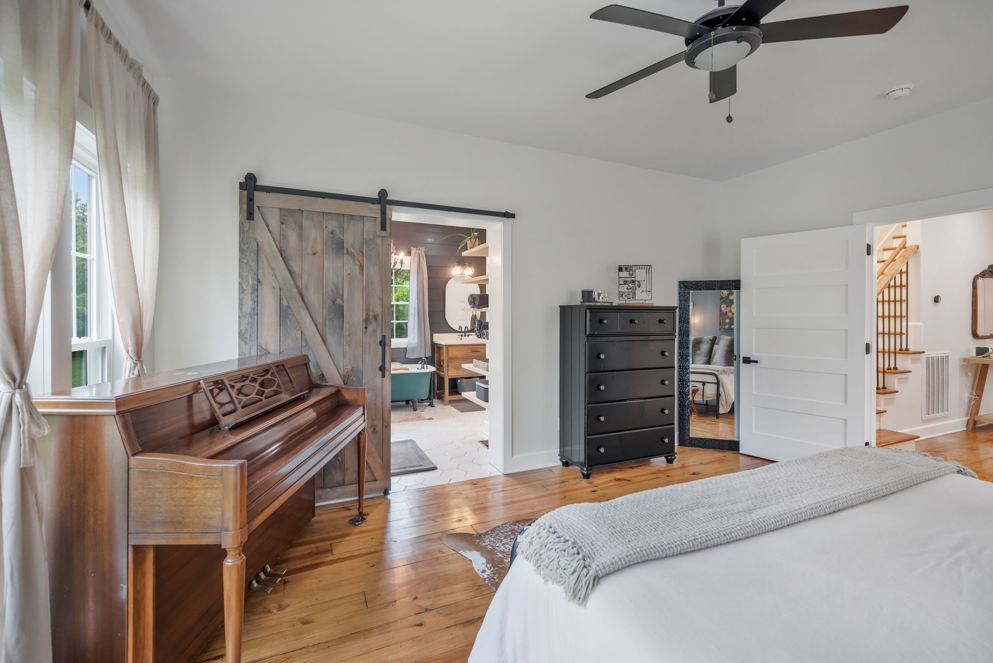 1006 Cherokee Trail Springfield, TN 37172 - Photo 25 of 49 a bedroom with a bed and furniture