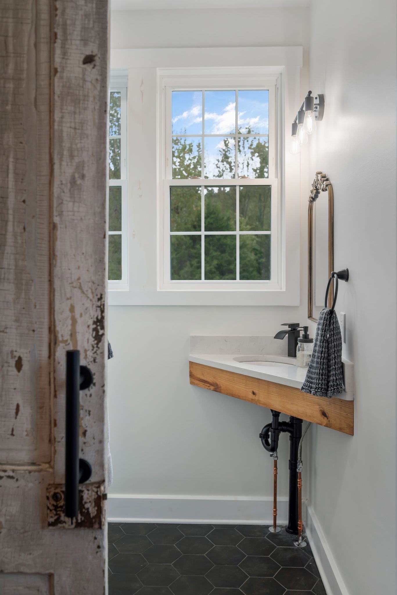 1006 Cherokee Trail Springfield, TN 37172 - Photo 37 of 49 a bathroom with a sink and a window