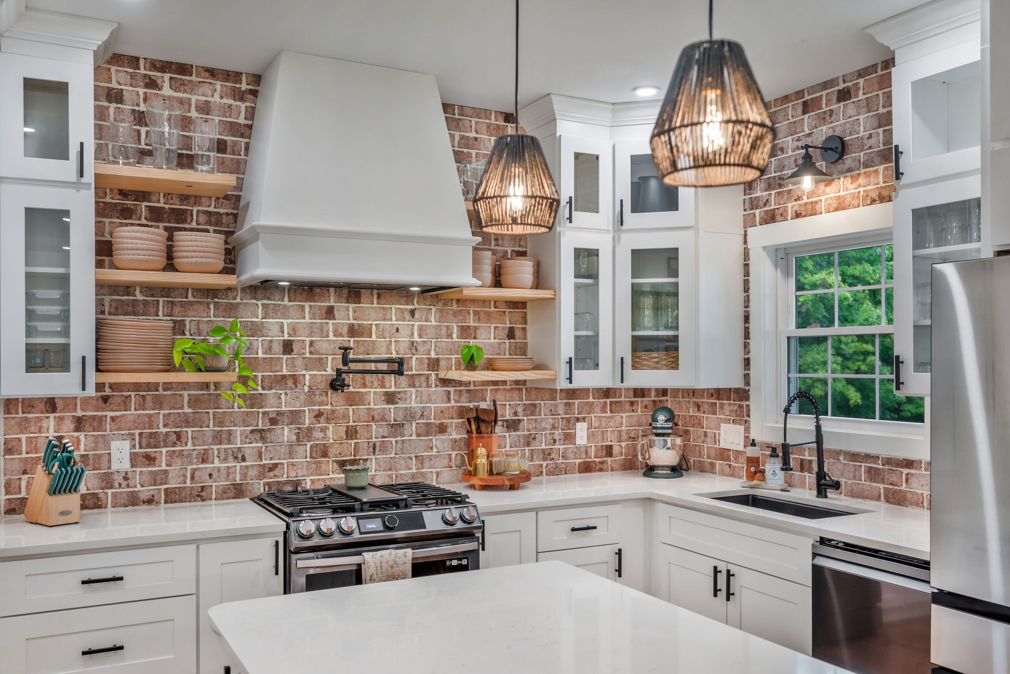 1006 Cherokee Trail Springfield, TN 37172 - Photo 7 of 49 a kitchen with stainless steel appliances a sink stove and cabinets