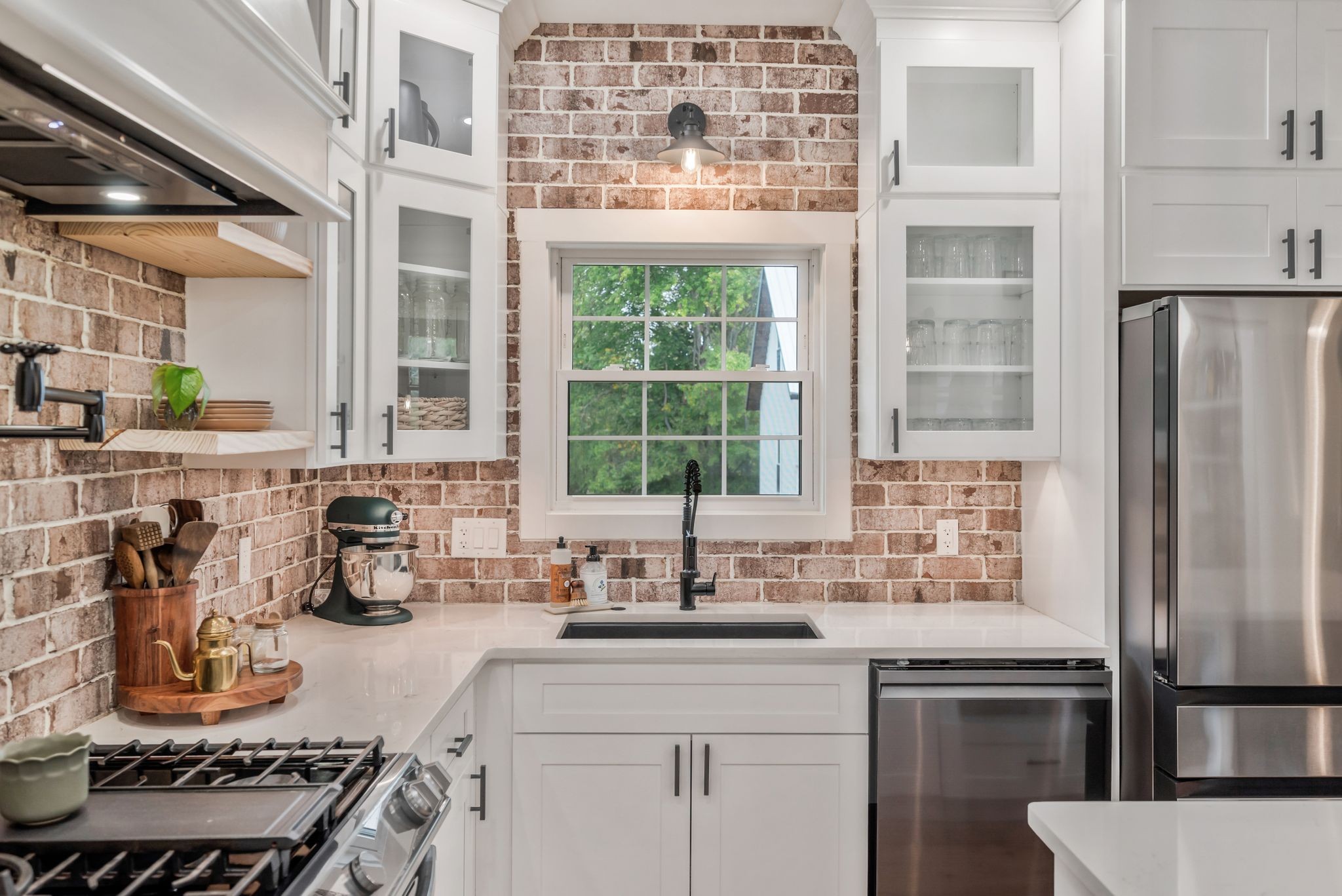 1006 Cherokee Trail Springfield, TN 37172 - Photo 9 of 49 a kitchen with stainless steel appliances a sink stove and a window