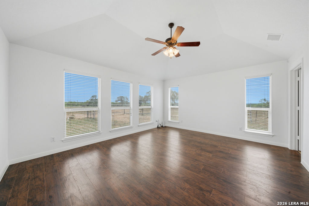 12897 La Vernia Road St. Hedwig, TX 78152 - Photo 20 of 34 a view of empty room with wooden floor and fan
