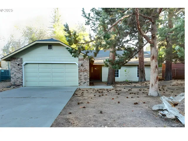 a view of a backyard of a house