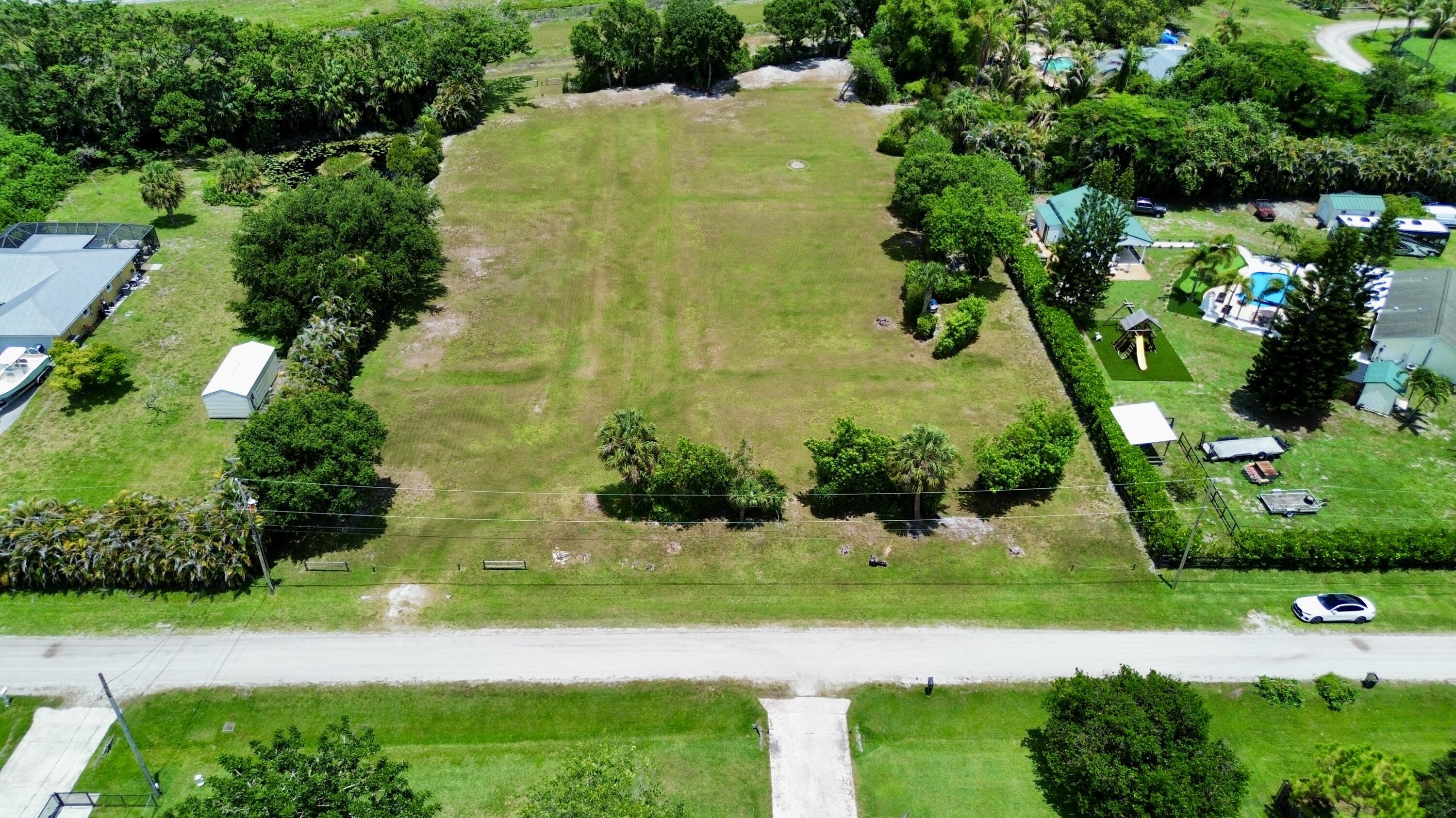 16546 74th Avenue North West Palm Beach, FL 33418 - Photo 2 of 16 dji_fly_20260620_145310_714_178198262018