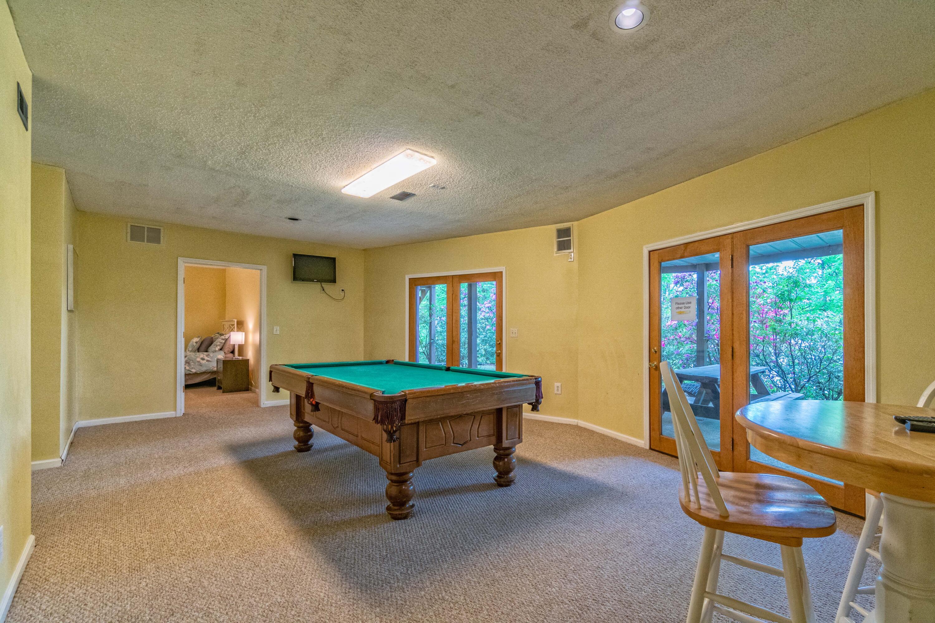 943 East Norris Point Road La Follette, TN 37766 - Photo 24 of 36 Downstairs Rec area