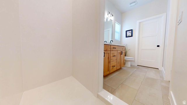 1127 4240 North Enoch, UT 84721 - Photo 23 of 56 Master Bathroom featuring vanity and light tile patterned floors