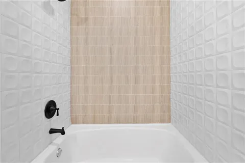 a bathroom with a bathtub