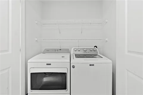 a view of a table and chairs in patio