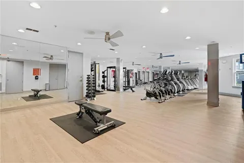 an aerial view of residential house with outdoor space and parking