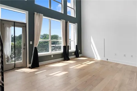 a view of a room with a large window