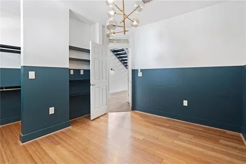 a view of a livingroom with wooden floor