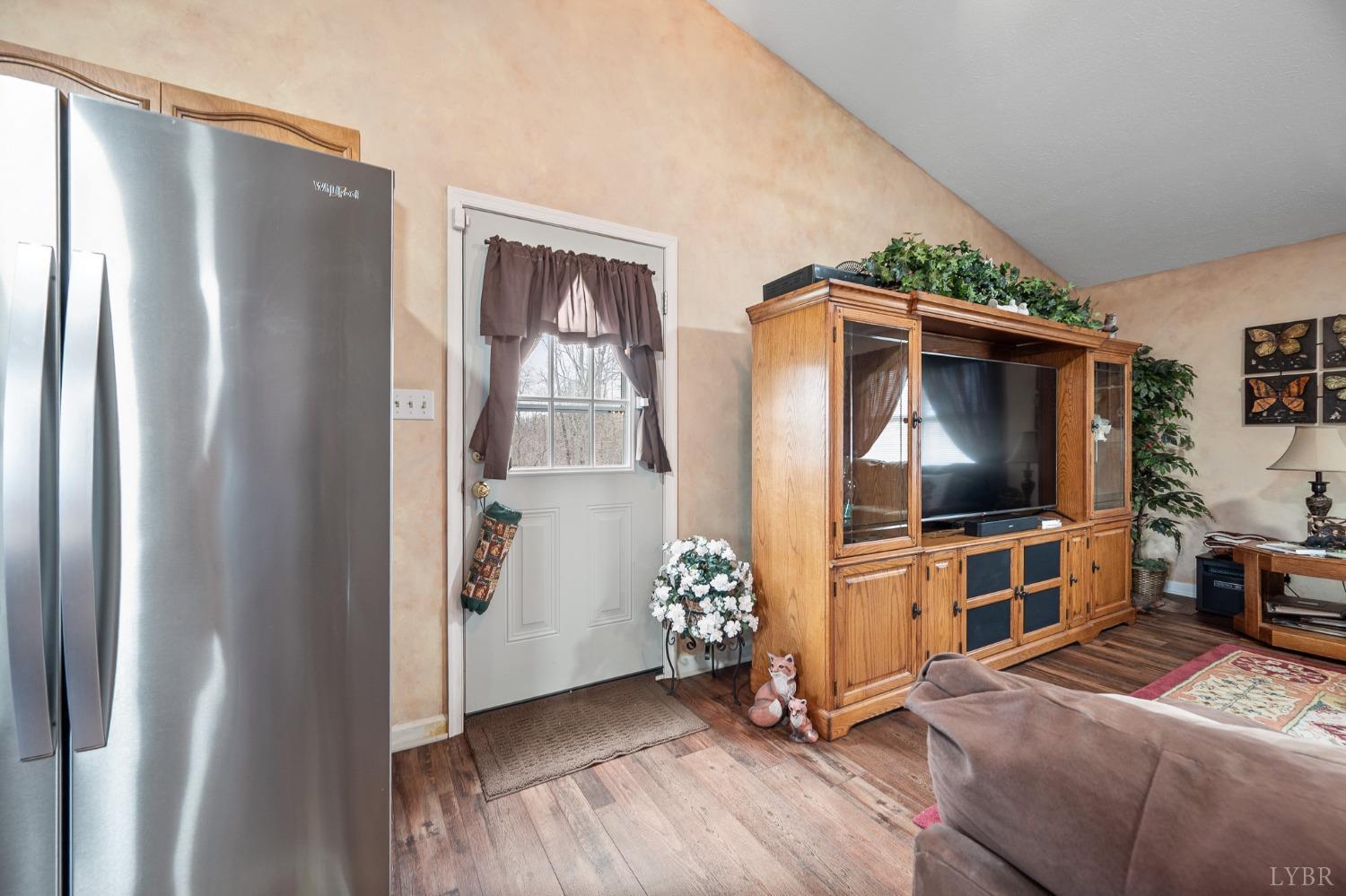 1425 Kentmoor Farm Road Madison Heights, VA 24572 - Photo 21 of 47 a living room with furniture and a flat screen tv