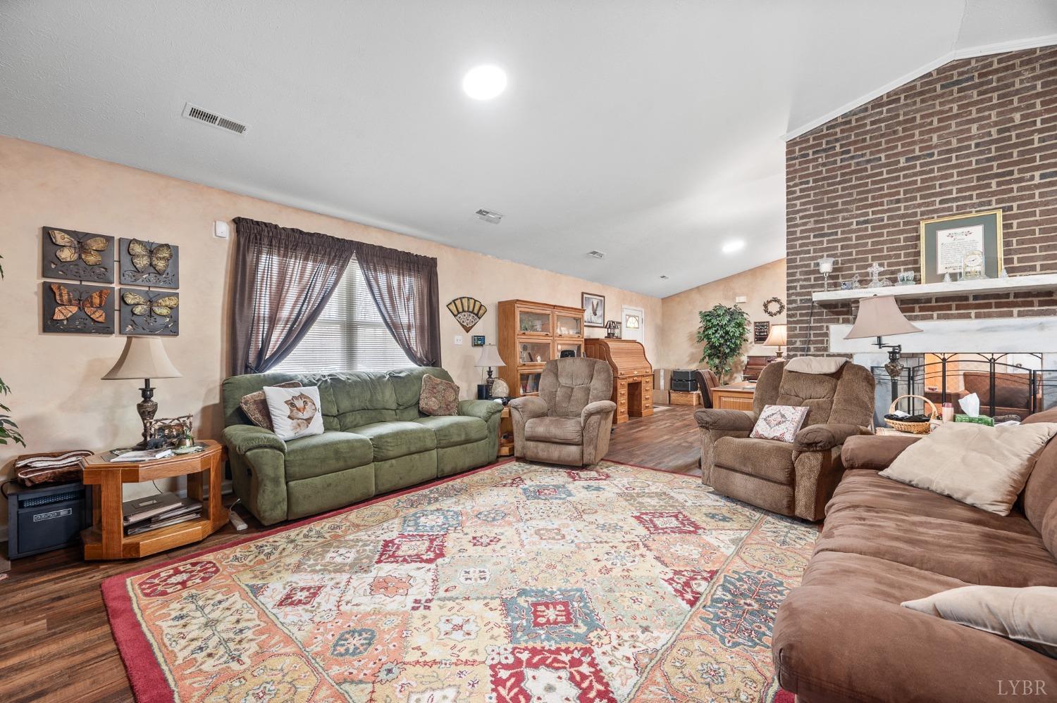 1425 Kentmoor Farm Road Madison Heights, VA 24572 - Photo 23 of 47 a living room with furniture and a rug