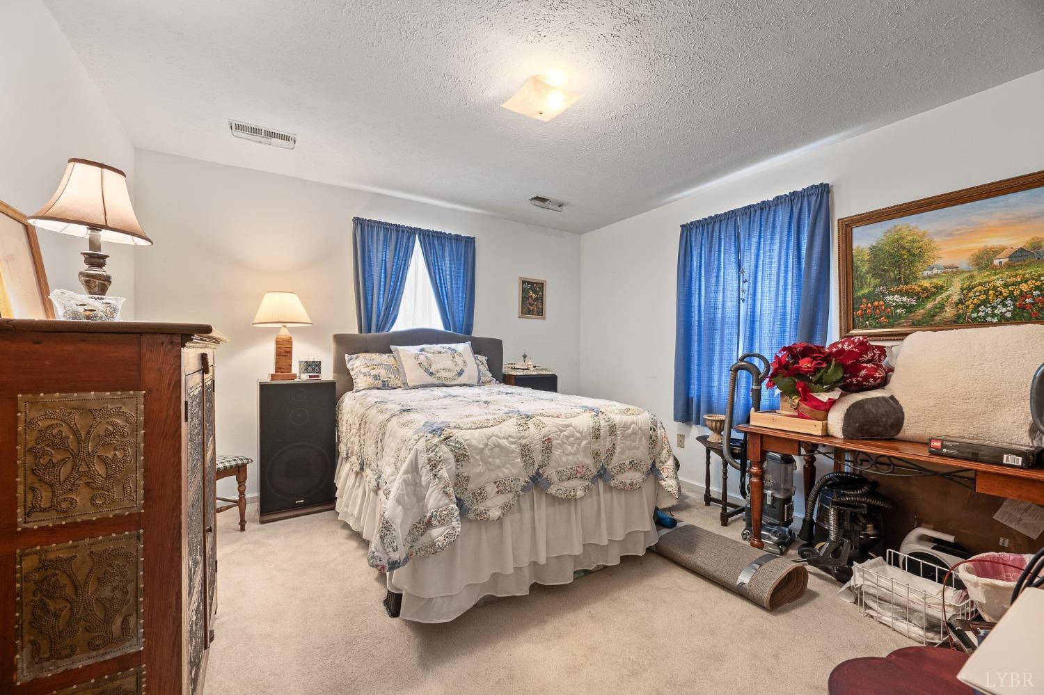 1425 Kentmoor Farm Road Madison Heights, VA 24572 - Photo 33 of 47 a bed room with a bed and a window