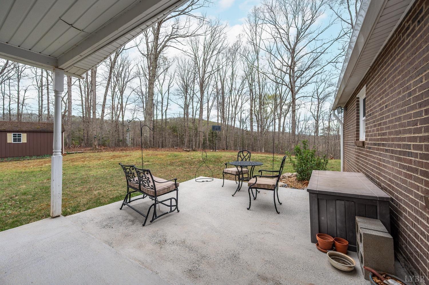 1425 Kentmoor Farm Road Madison Heights, VA 24572 - Photo 41 of 47 a view of a chairs and table in patio