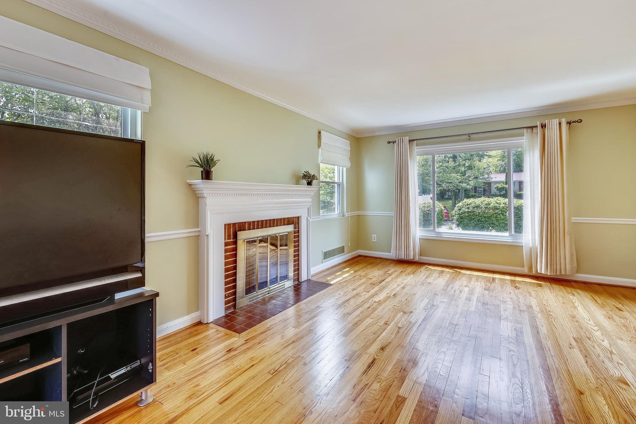 2501 Plyers Mill Road Silver Spring, MD 20902 - Photo 19 of 68 Living room floors are gorgeous!