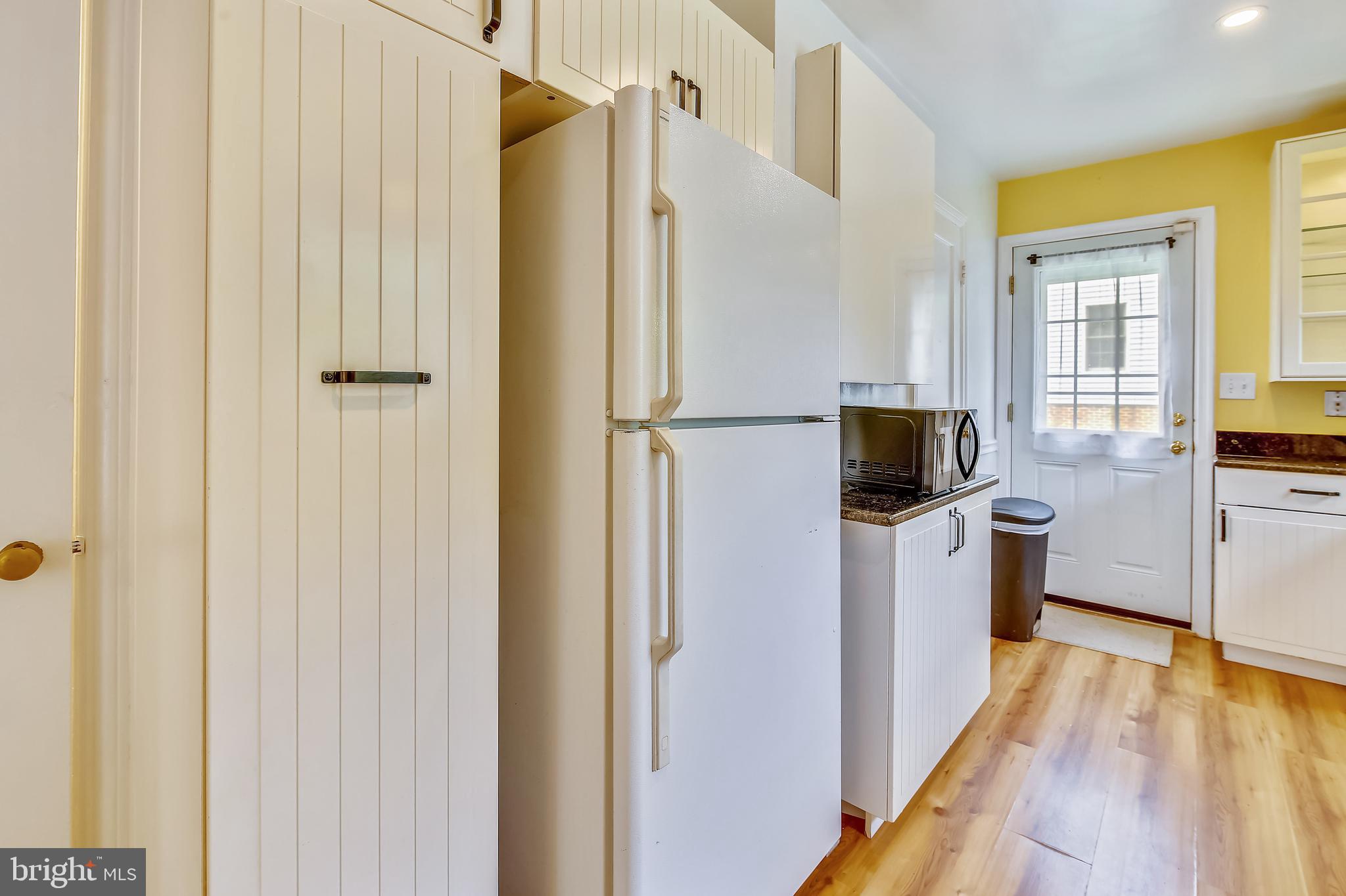 2501 Plyers Mill Road Silver Spring, MD 20902 - Photo 24 of 68 Kitchen with pull out pantry cabinet