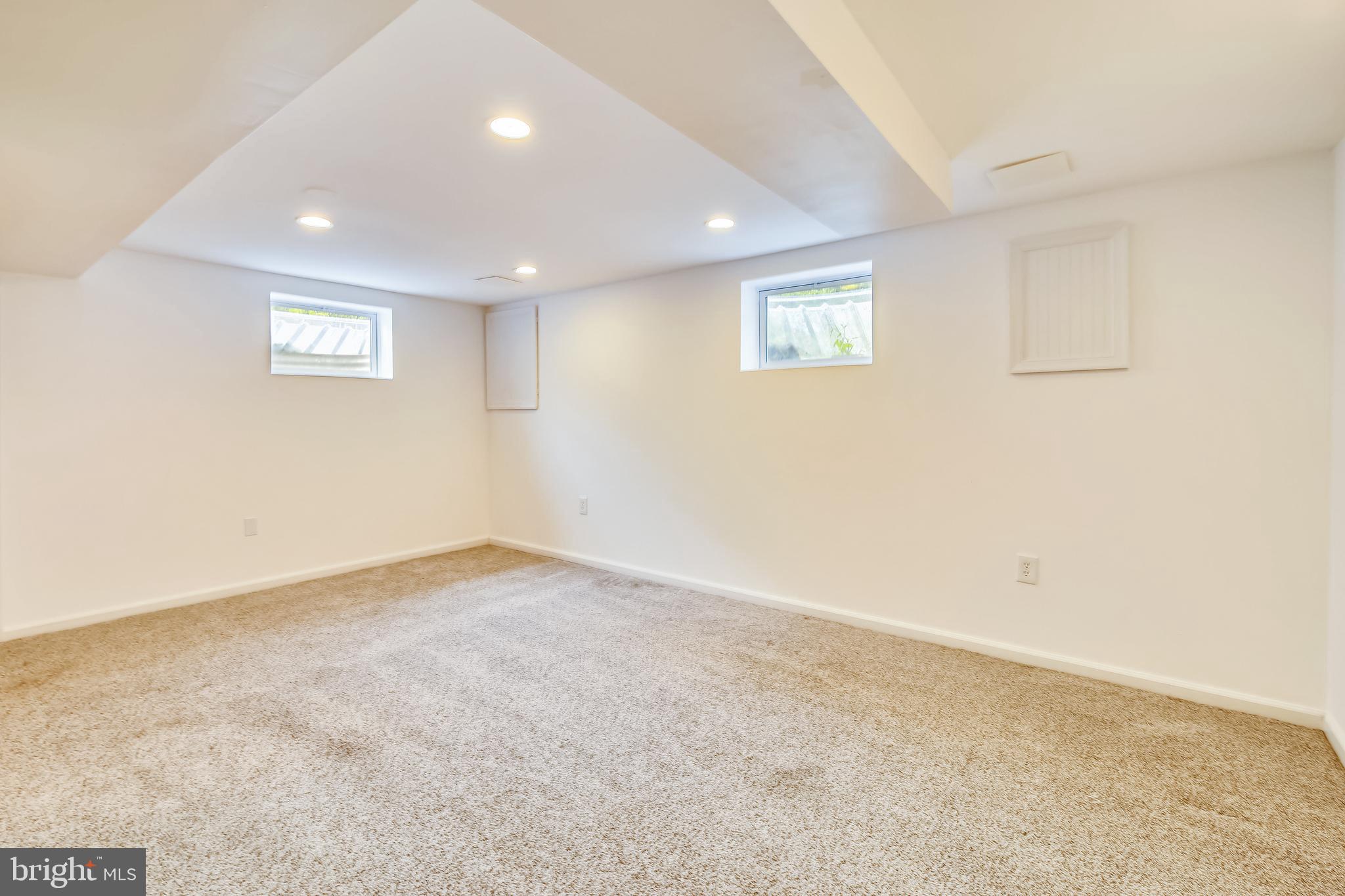 2501 Plyers Mill Road Silver Spring, MD 20902 - Photo 41 of 68 Family room with recessed lighting & carpet