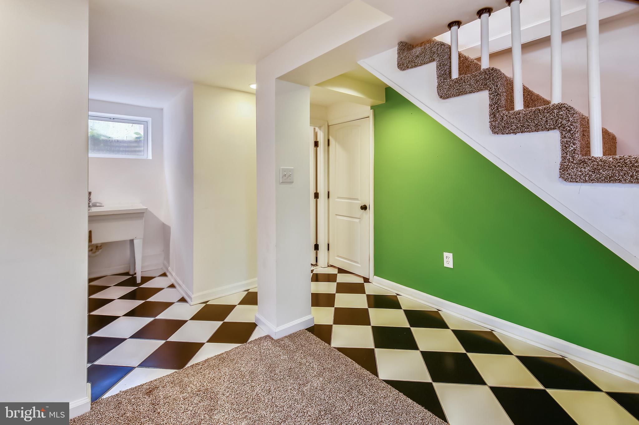 2501 Plyers Mill Road Silver Spring, MD 20902 - Photo 43 of 68 Family room toward laundry room