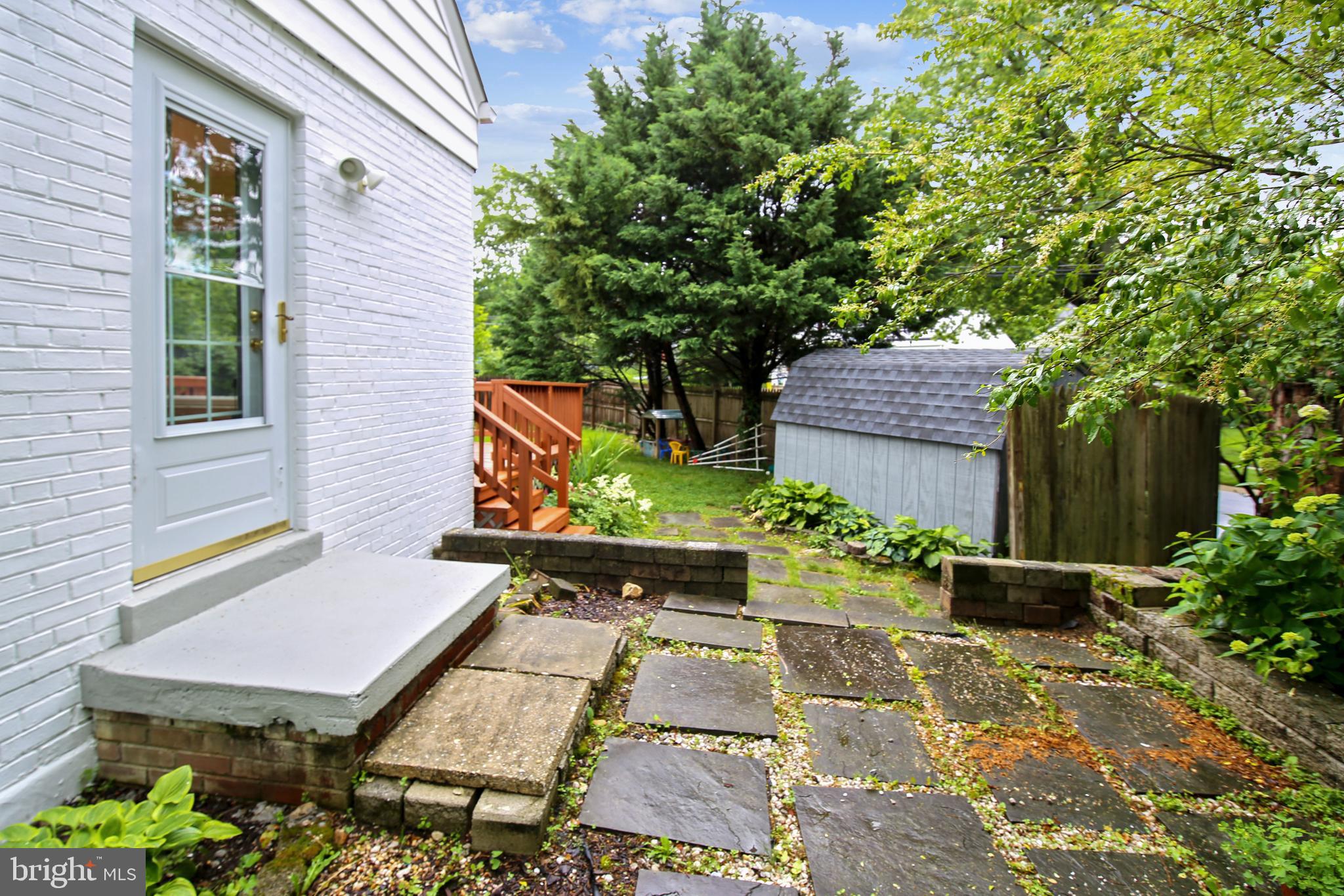 2501 Plyers Mill Road Silver Spring, MD 20902 - Photo 50 of 68 Side patio off the living and dining rooms