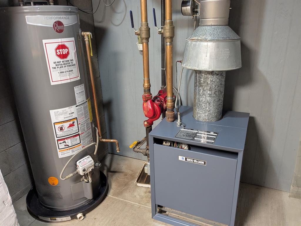 637 Wallace Run Road Beaver Falls, PA 15010 - Photo 39 of 43 Boiler and Hot Water Tank