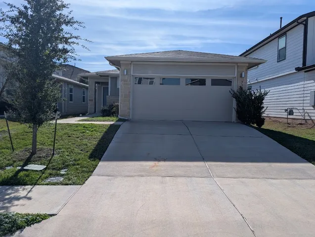 a view of a house with a garden